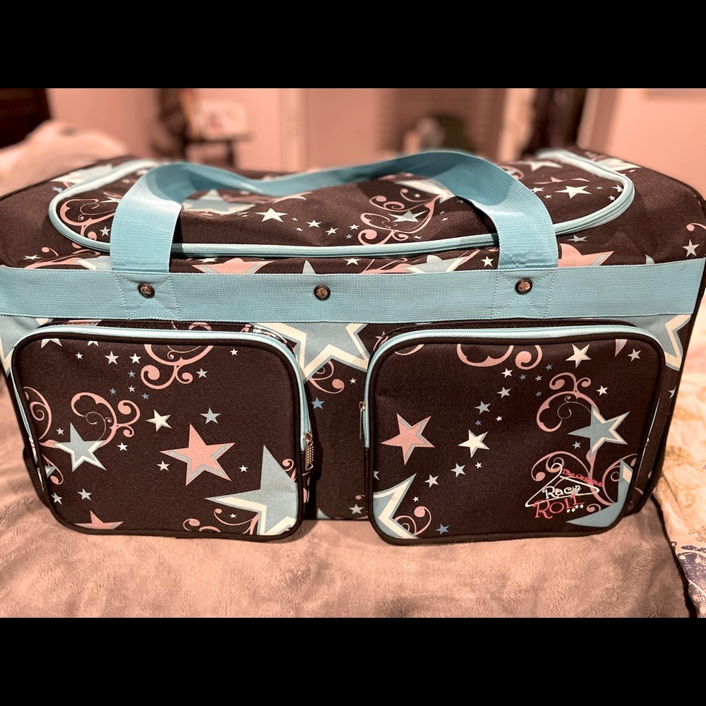 Rac & Roll medium size dance bag.  Like new condition with poles.
